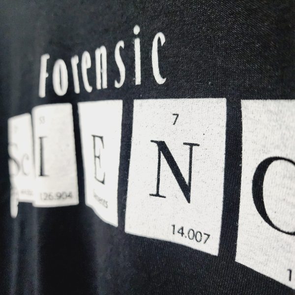 Elements that spell out "Science" on a short sleeve black tee