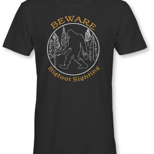 Short sleeve black tee shirt. Beware - Bigfoot sighting. Designed by I.AN.ART