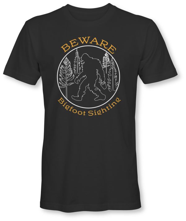 Short sleeve black tee shirt. Beware - Bigfoot sighting. Designed by I.AN.ART